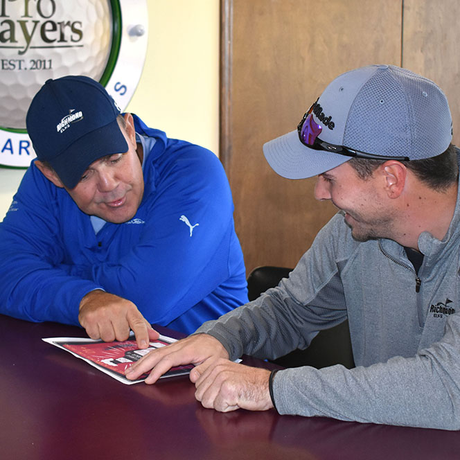 Photo of two men looking at a brochure. Link to Life Stage Gift Planner Under Age 60 Situations. lsgp_60.jpg